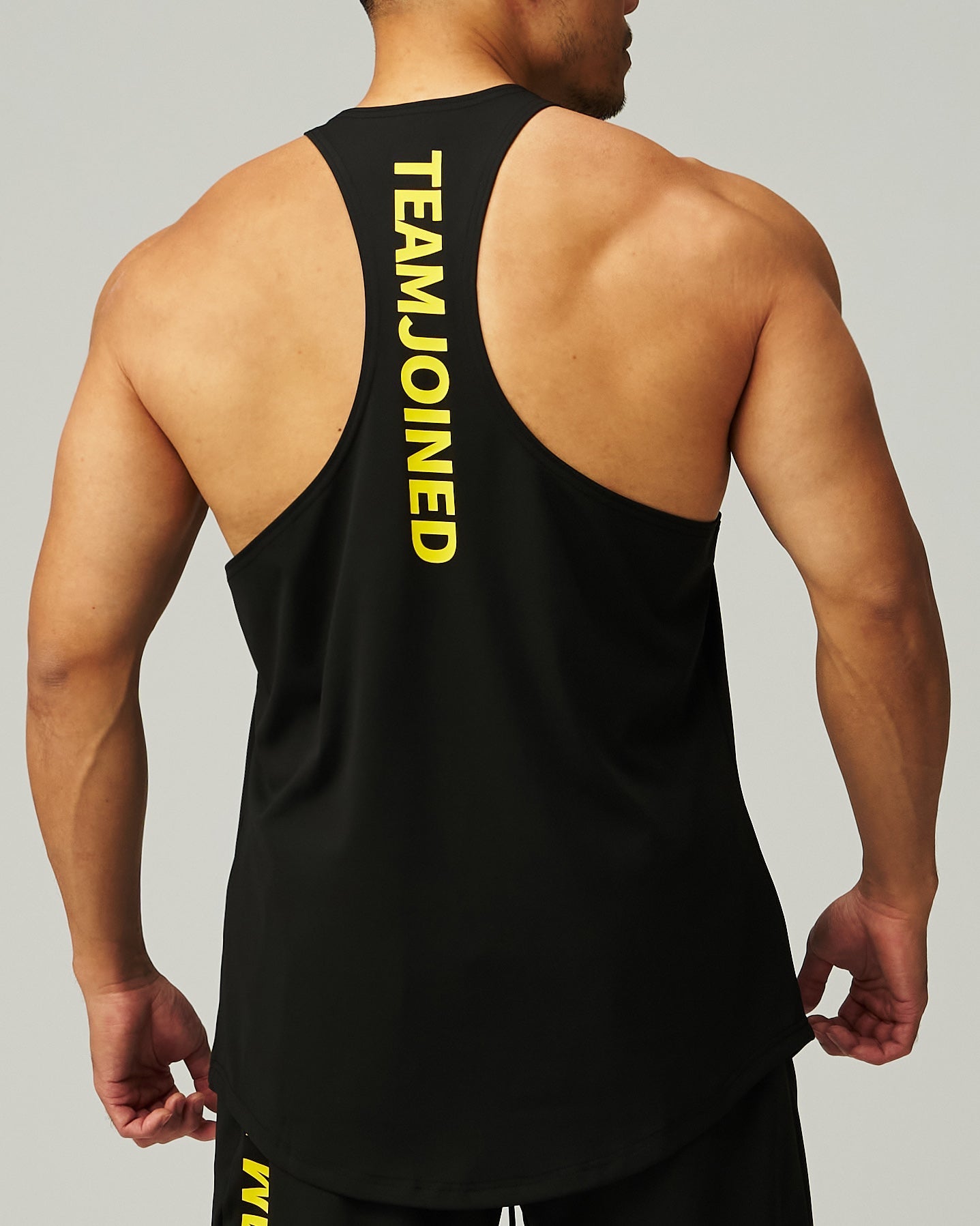 Adapt Spine logo Muscle Stringer